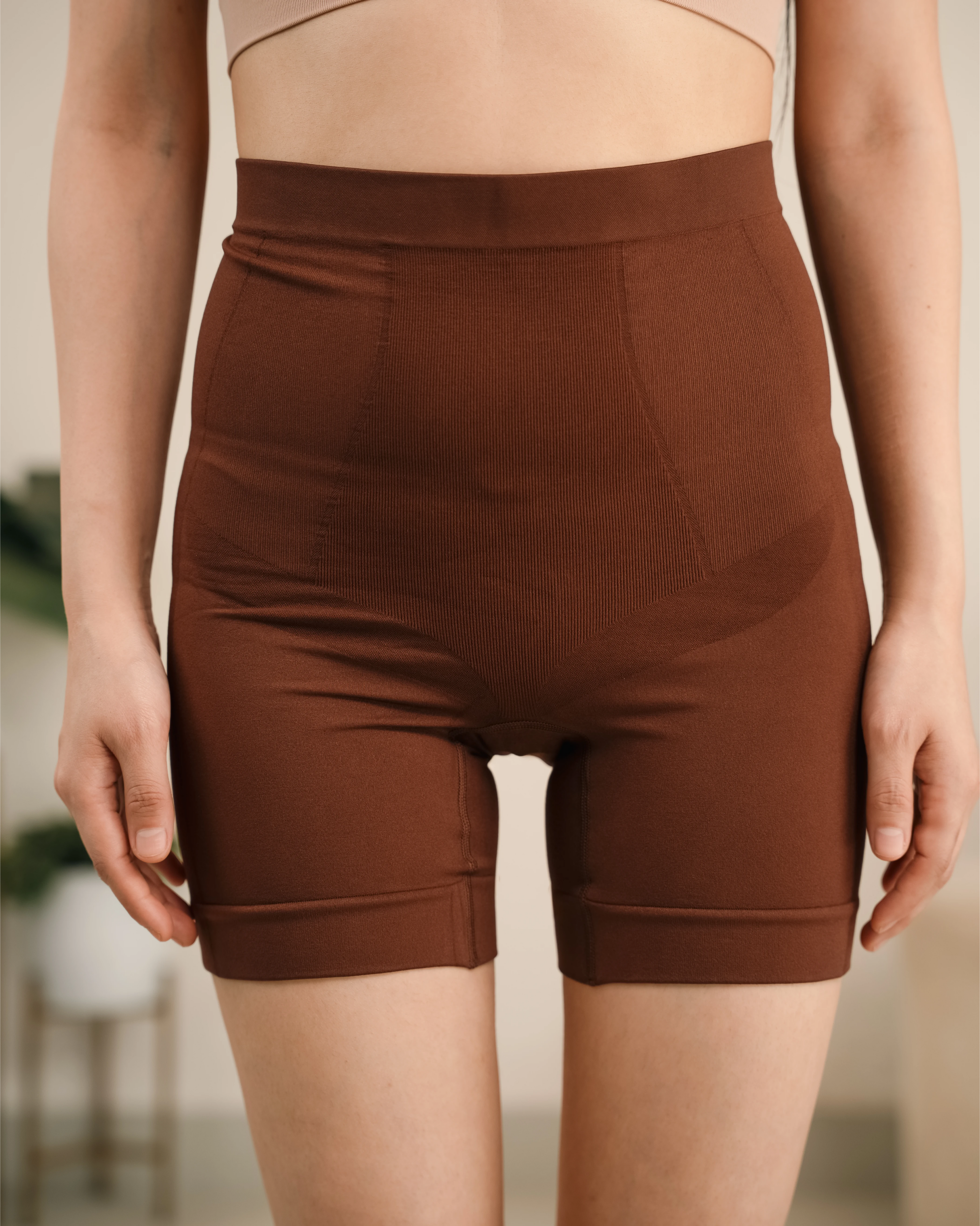 Brown hip dip shapewear shorts with tummy control and butt lifting support for women